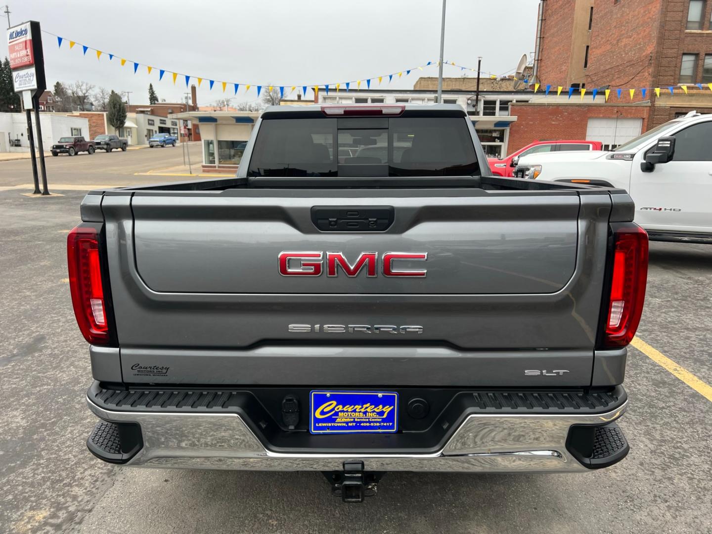 2021 Blue /Blue GMC Sierra 1500 SLT (3GTU9DED7MG) with an 5.3L V8 engine, automatic transmission, located at 116 5th Avenue South, Lewistown, MT, 59457, 47.063877, -109.427879 - Unleash the Power of the Roads with Our Pre-Owned 2021 GMC Sierra 1500 Crew Cab 4WD! Experience the thrill of the open road in this stunning GMC Sierra 1500, a beast on wheels that's ready to conquer any terrain! Don't miss your chance to own this powerful machine - now available in our pre-owned - Photo#3